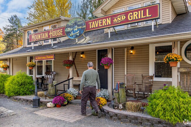 Patio at Mountain House Tavern with views of Kittatinny Lake in Montague.