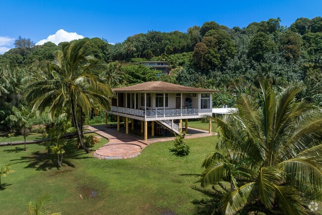 Homes in Hanalei often feature large lanais, ideal for enjoying the stunning sunsets.