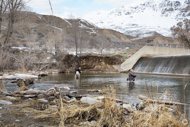Anglers enjoy fishing along the scenic Provo River near Cascade neighborhood.