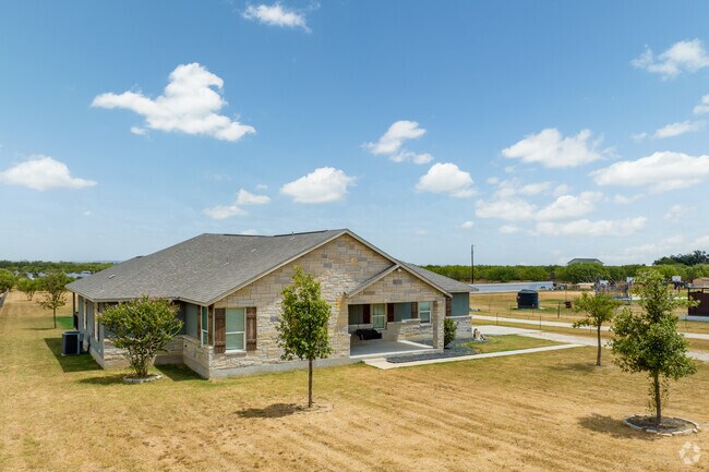 A limestone traditional home with great acreage located in Somerset.