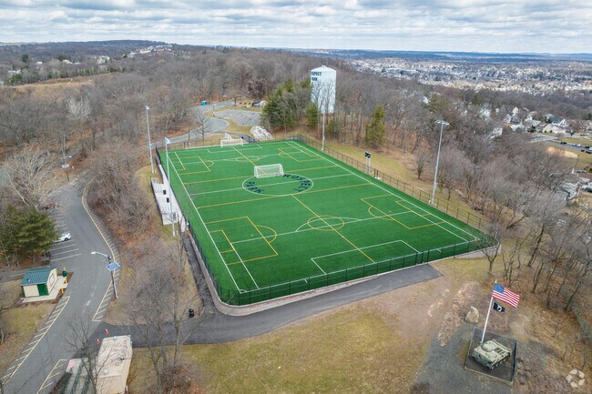 Enjoy soccer at Hofstra Park's field, a space for sports and camaraderie in Prospect Park.
