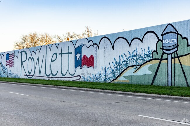 Locals know they are home when they cross Hwy 66's bridge with the well-known mural.