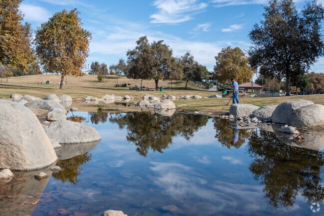 A man is searching for hidden treasure at The Park at River Walk near River Oaks.