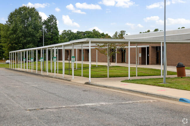 The drop-off area of Union Cross Elementary School is organized for efficiency and safety.