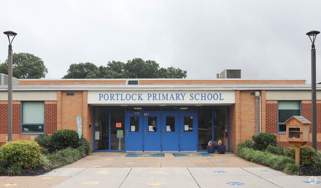 Portlock Primary School has a paw themed walkway near the school's entrance.