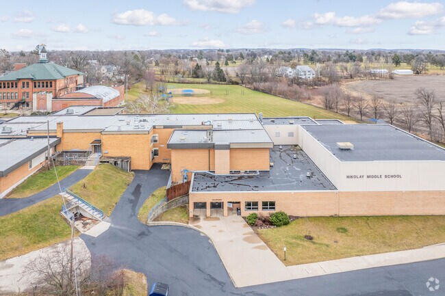 Students in their early teens may attend Nikolay Middle School.