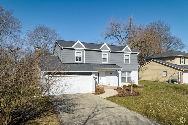 Colonial revivals sit on well-maintained lawns in Beau Bien.