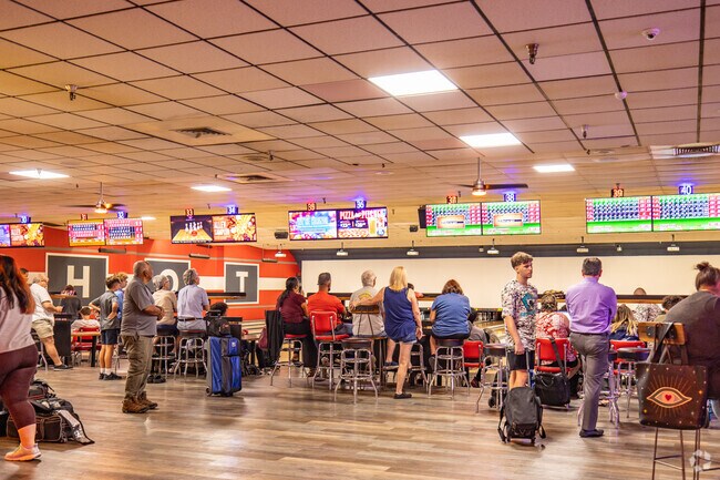 Have friendly competitions at Bowlero in Tamarac while living in Woodmont.