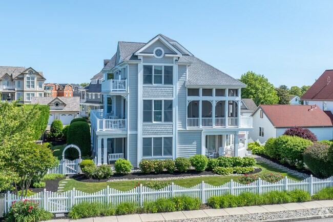 New construction traditional style homes with private lawns are built right on the water.