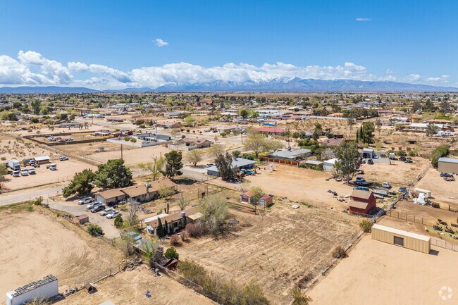 People settle into Golden Arrow Ranchos for convenience to everyday amenities in a rustic, desert atmosphere.