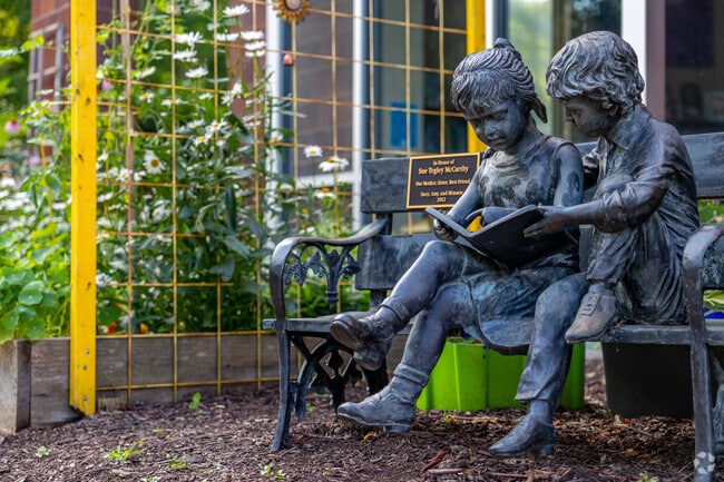 Scott Township displays statues outside of the public library.