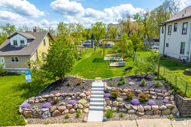 Tucked among neighboring homes, the Forest Ave Community Orchard offers residents garden space.