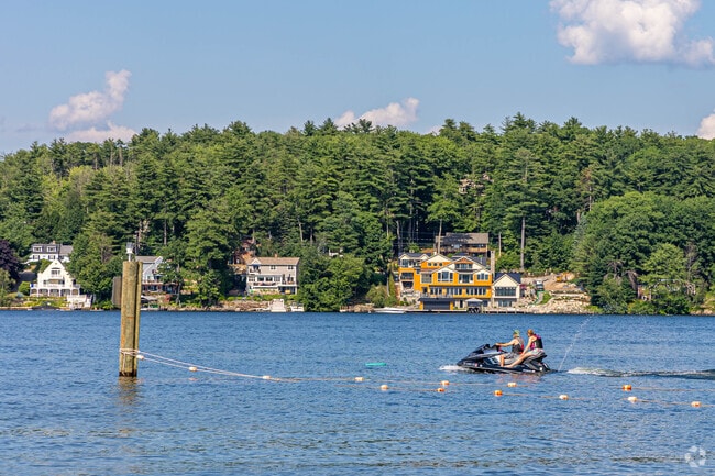 Riding a jet ski on Lake Winnipesaukee near New Durham on a summer day.
