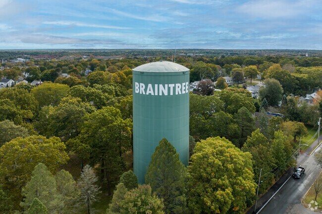 The water tower marks North Braintree’s skyline near major Boston highways.