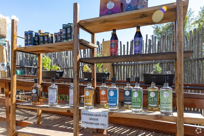 Tumbleroot Brewery sells their own spirits for those looking to drink local in Agua Fria.