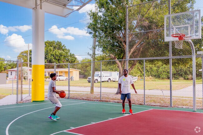 Downtown Fort Pierce locals enjoying the basketball courts at Lincoln park.
