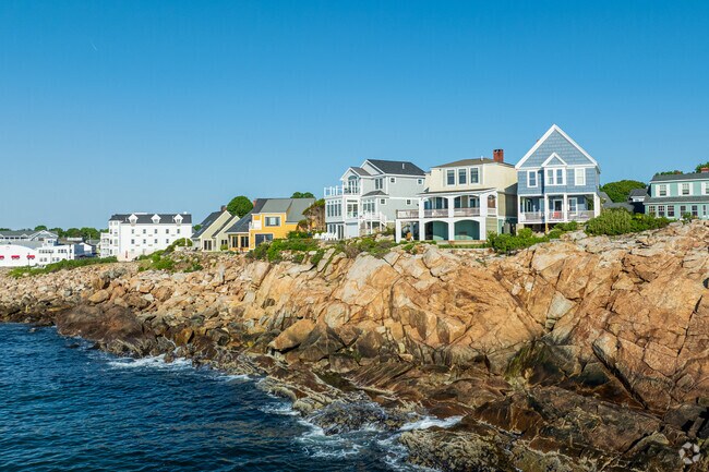 A row of homes in Cape Neddick with waterfront views.