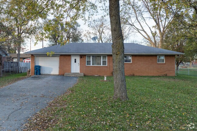 This ranch-style single family residence with gabled roof is common in North Perry.