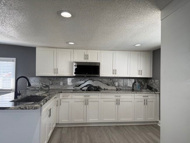 8811 Poe Dr, Town 'N' Country, FL 33615 - photo 6