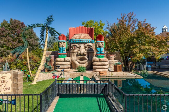 Play a round of mini-golf at Adventure Golf near Shaw Heights.