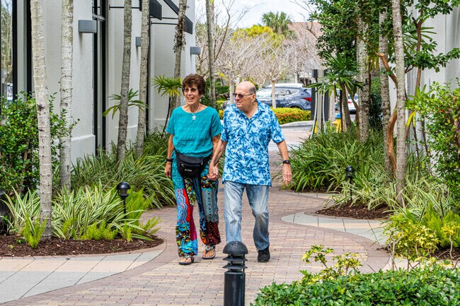 Residents enjoy the open-air mall in Palm Beach Farms.