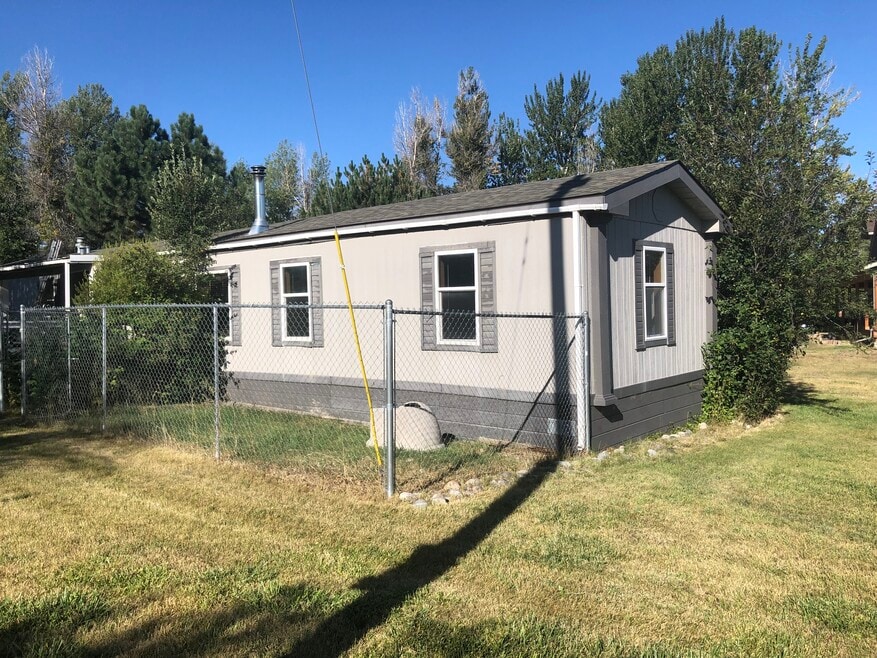 1995 Champion mobile home on private lot. UTI