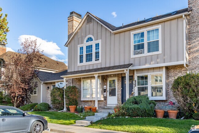 Townhouse condos with manicured lawns line the streets of Charter.