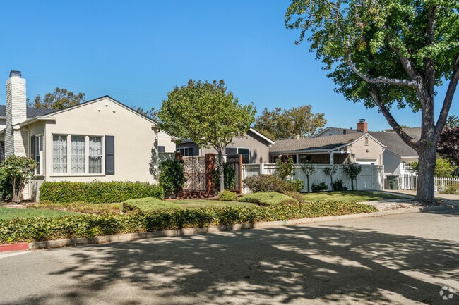 The cozy homes in Oak Grove Manor offer tree-shaded sidewalks and peaceful neighborhood views.