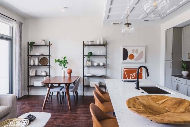 With chic quartz countertops and striking pendant lighting, your home is ideal for hosting.