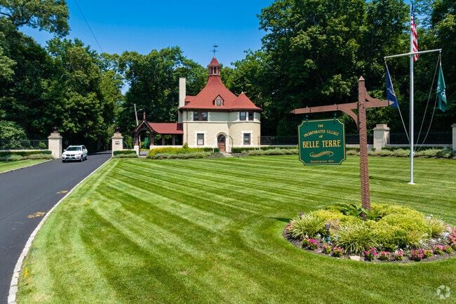 Welcome to scenic Belle Terre, an exclusive community protected by a French-inspired gate.