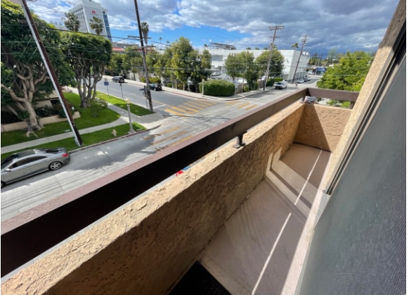 master bedroom balcony facing hte street