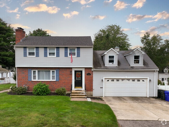 This two-story home with an attached garage is part of the Eaton Heights neighborhood.