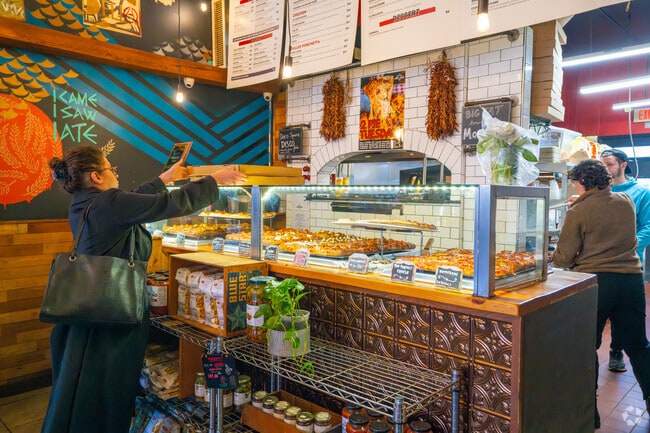 Mortadella Head in Davis Square is well-known for its pizza and sandwiches.