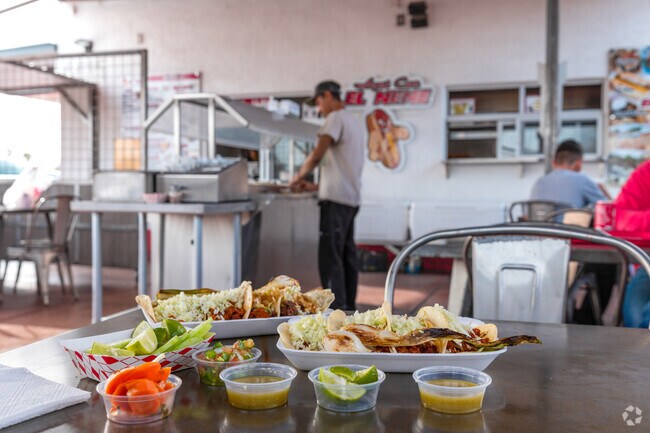 Locals love the carne asada and al pastor tacos at Aqui Con El Nene in Tucson, Arizona
