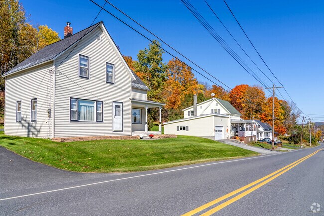 A row of homes along Graniteville road are elevated above the main road.