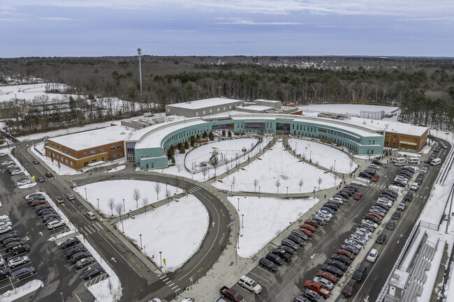 An aerial view of the large John F. Kennedy Elementary School campus in Holbrook, MA.