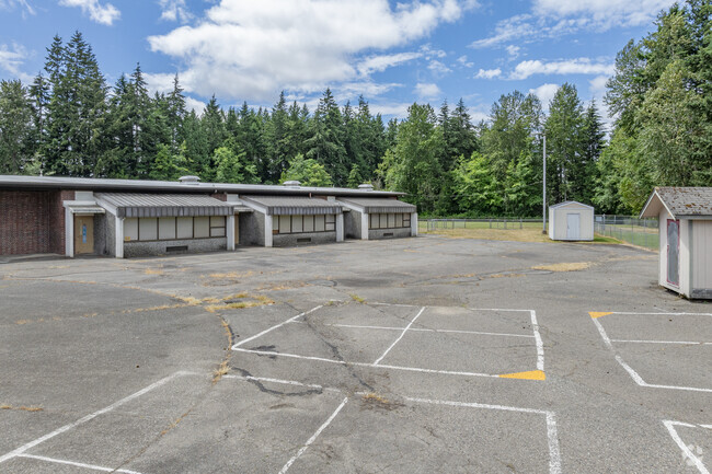 Views of the outdoor play courts at Orchard Heights Elementary School.