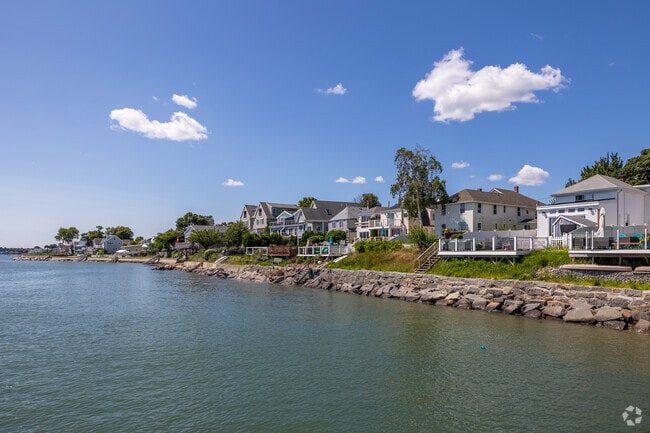 Rows of Stunning homes line the coast of Houghs Neck.