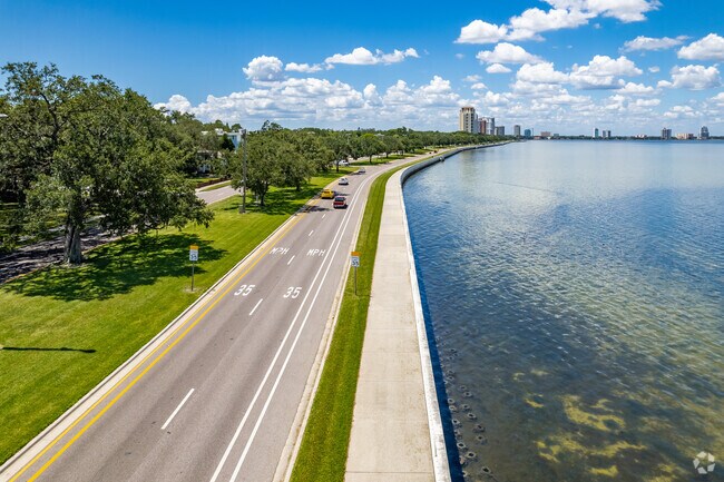 Drive along the Bayshore Boulevard and sidewalk heading toward downtown Tampa.