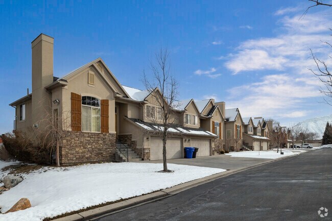 Hilly driveways lead to narrow sidewalks on many Millcreek lots.