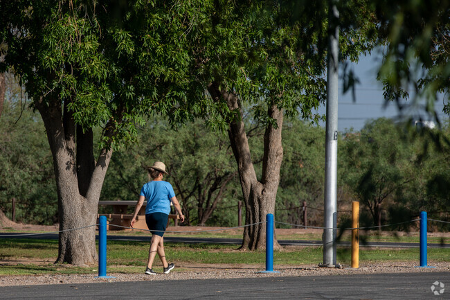 Los Ranchitos residents enjoy the green space at Augie Acuna Los Ninos Park.