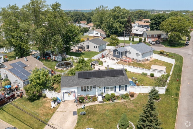 Homes are often placed on their lots cady-cornered at the end of many streets in Brentwood, NY.