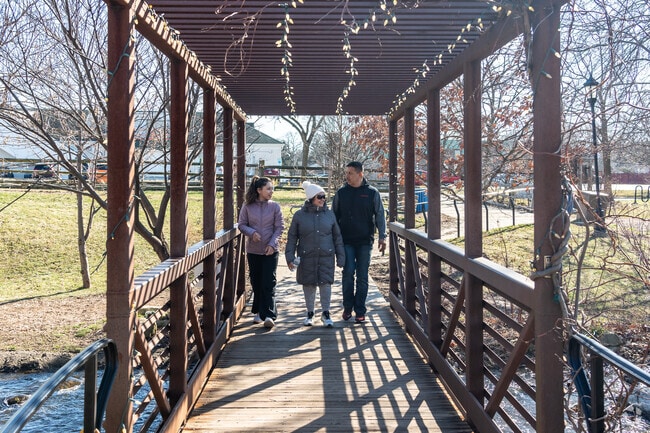 Take a stroll across the pedestrian bridge at Lake Katherine.