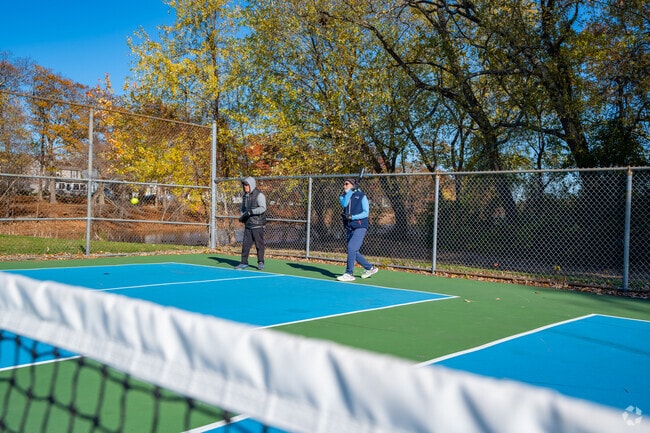 Play a game of pickleball at Lakeshore Park near Indian Ridge.