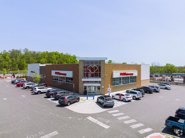 CVS sits conveniently across from Goshen Plaza for easy shopping.