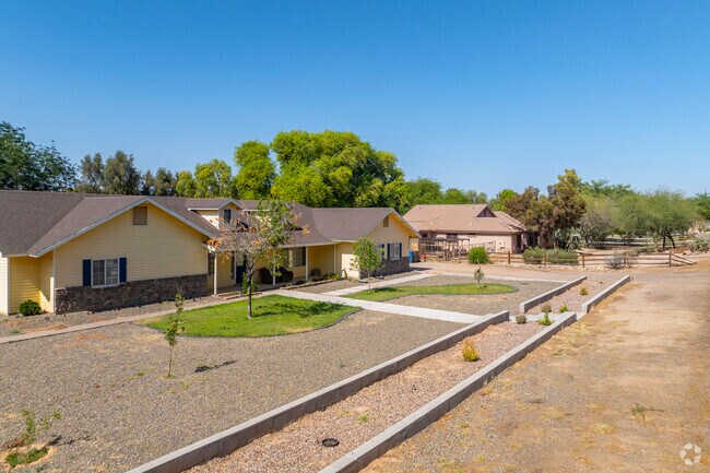 With their low profiles and earthy tones, the ranch-style homes in Chandler Heights Citrus blend beautifully with the desert landscape.