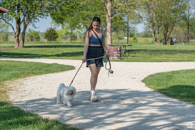 Walking trails at Springbrook Prairie offer peaceful prairie views and easy access from West Sanctuary Lane.