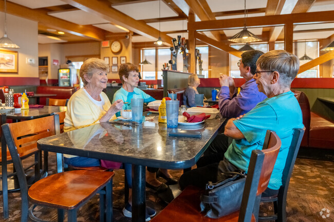 Friends come together for a meal at the Highway 63 Diner near Audubon.