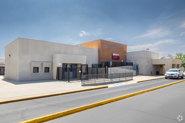A parent waits in the student pick-up zone at Estudillo Elementary School in San Jacinto.