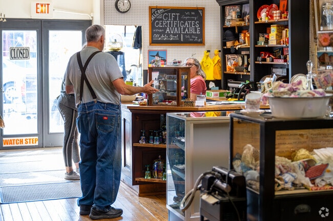 Inside Yellow Moon Antique Mall in Mooresville, locals catch up on gossip.